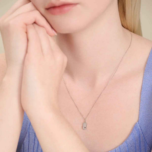 M by Monte Luna 1/10 ct. tw. Lab-Grown Diamond Mini Heart Tag Pendant in Rhodium Plated Sterling Silver front view