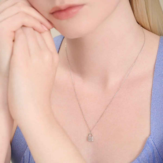 M by Monte Luna 1/5 ct. tw. Lab-Grown Diamond Lock Pendant in Rhodium Plated Sterling Silver front view