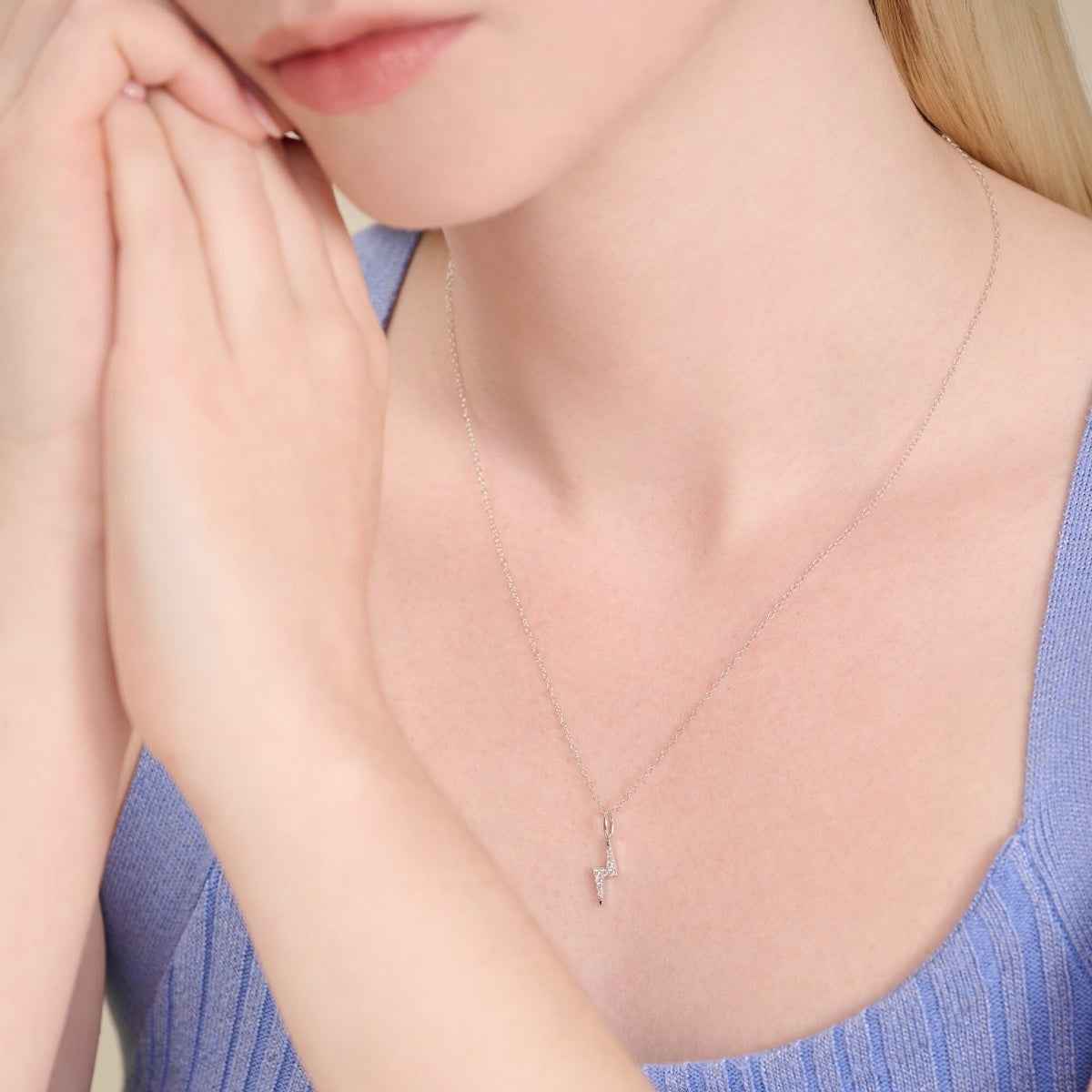 M by Monte Luna 1/10 ct. tw. Lab-Grown Diamond Lightning Bolt Pendant in Rhodium Plated Sterling Silver front view