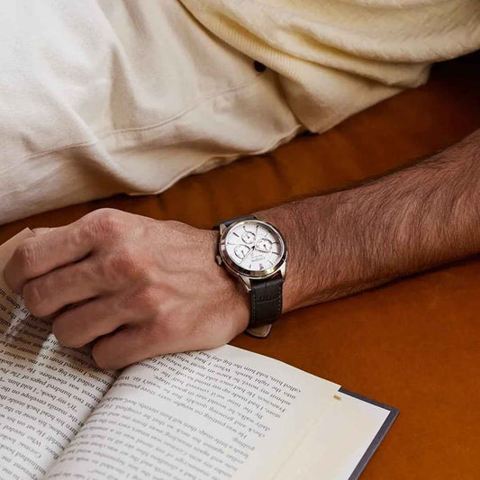 Citizen Men's Rolan Eco-Drive Stainless Steel Watch with Silver Dial close-up detail