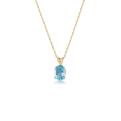Blue Oval Topaz Pendant and Earring Set in 10K Yellow Gold front view