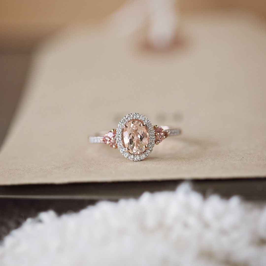 Impulse Collection Genuine Oval Morganite Fashion Ring with 1/10 ct. tw. Diamond Halo & Pink Sapphire Accented Band full view