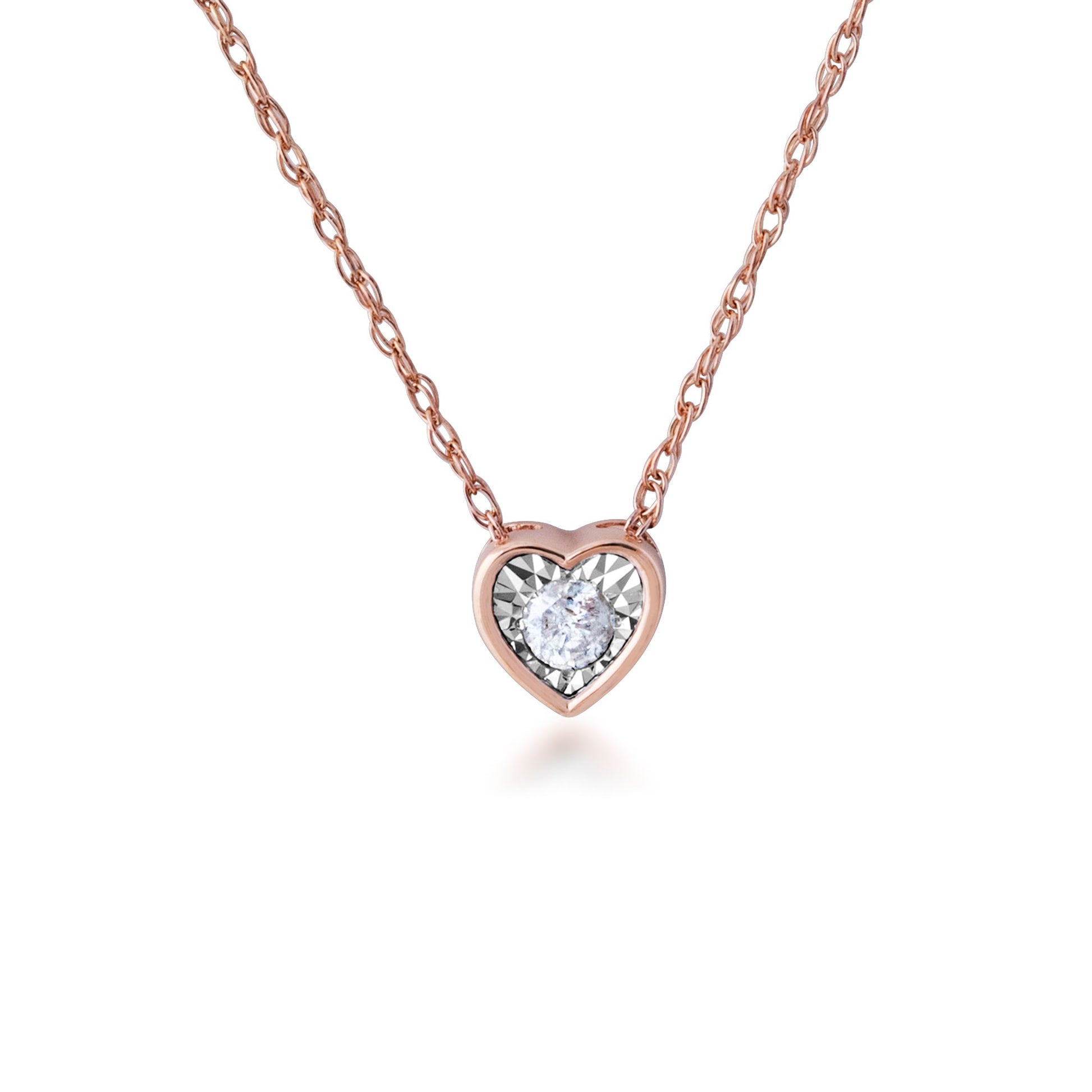 1/10 ct. tw. Diamond Heart Shaped Bezel Pendant in 10K Pink and White Gold