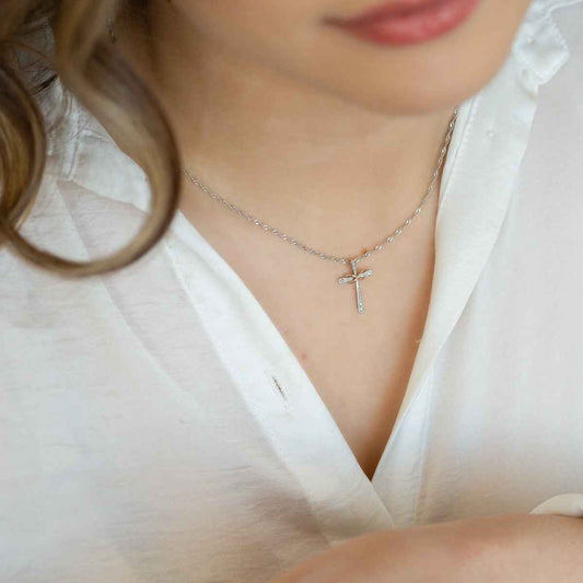 .025 ct. tw. Diamond Cross Pendant with 10K Pink Gold Infinity-Design Ribbon in Sterling Silver front view