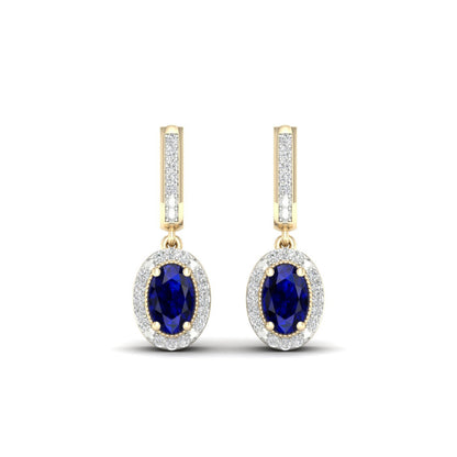 Blue Oval Sapphire and 1/10 ct. tw. Diamond Halo Earrings with Milgrain and Filigree Design in 10K Yellow close-up detail