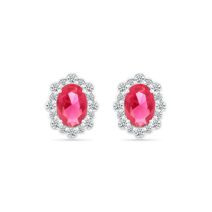 Oval Ruby & 3/8 ct. tw. Diamond Halo Earrings in 14K White Gold front view