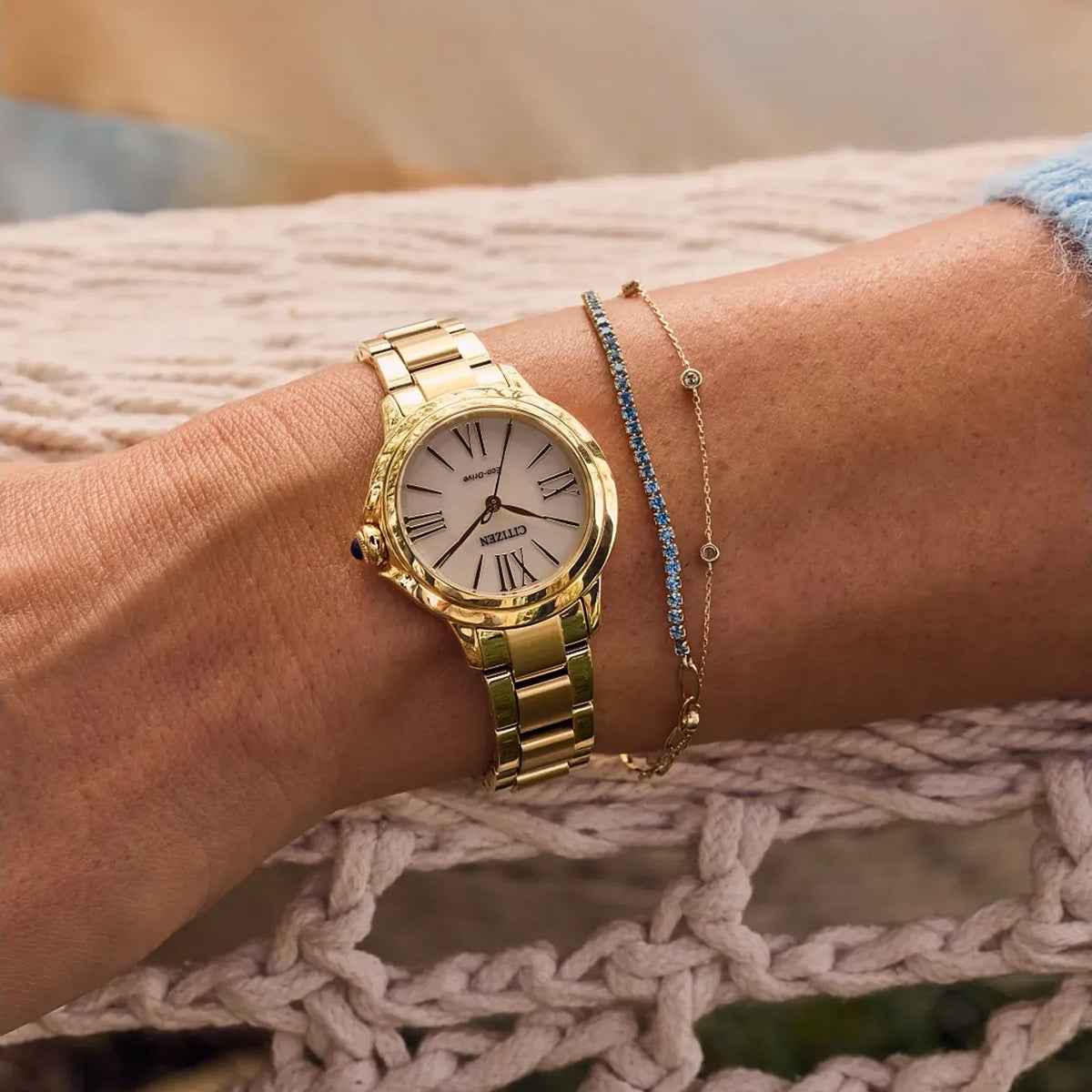 Citizen Ladies' L Ceci Eco-Drive Gold-Tone Stainless Steel Watch with White Dial side profile