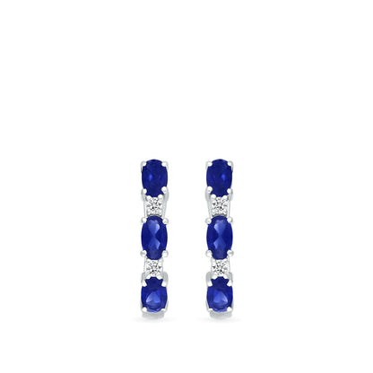 Oval Sapphire & 1/10 ct. tw. Diamond U-Hoop Earrings in 10K White Gold front view