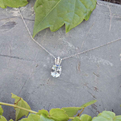 Oval Aquamarine & Diamond Pendant in 10K White Gold front view
