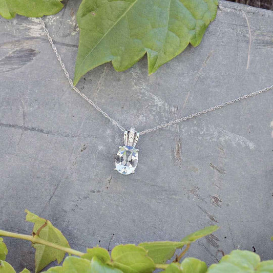 Oval Aquamarine & Diamond Pendant in 10K White Gold front view