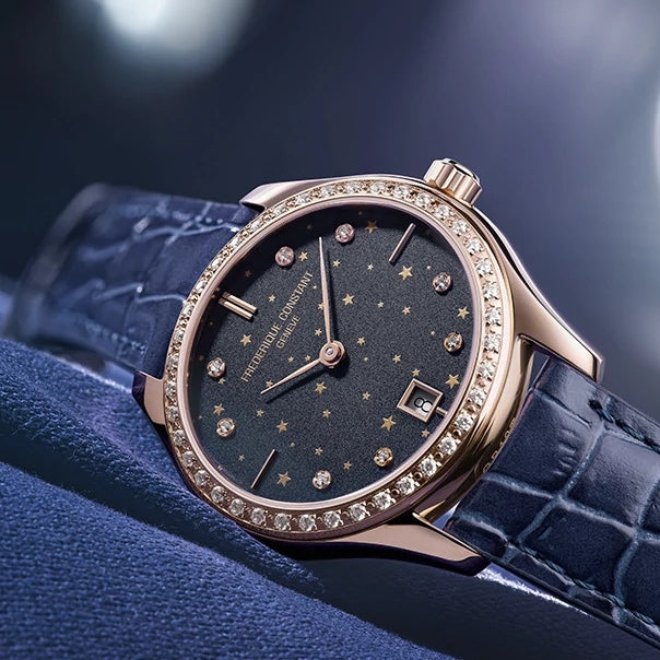 Frederique Constant Ladies' Quartz Rose Gold-Tone Stainless Steel Watch with Blue Dial & Leather Strap close-up detail