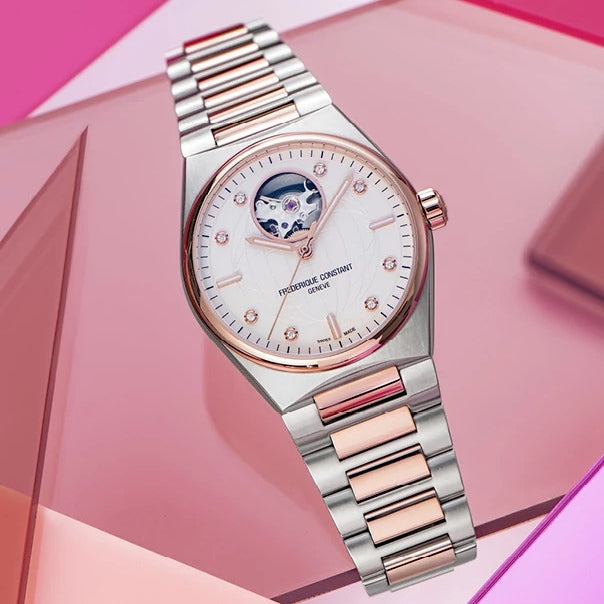 Frederique Constant Ladies' Highlife Heart Beat Automatic Two-Tone Stainless Steel Watch with White Dial close-up detail