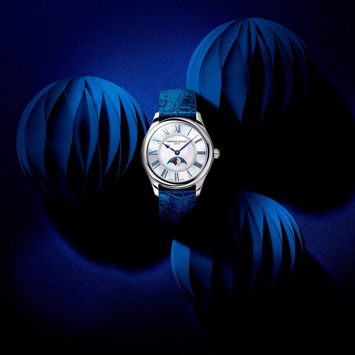 Frederique Constant Ladies' Elegance Luna Automatic Stainless Steel Watch with White Dial & Blue Leather close-up detail