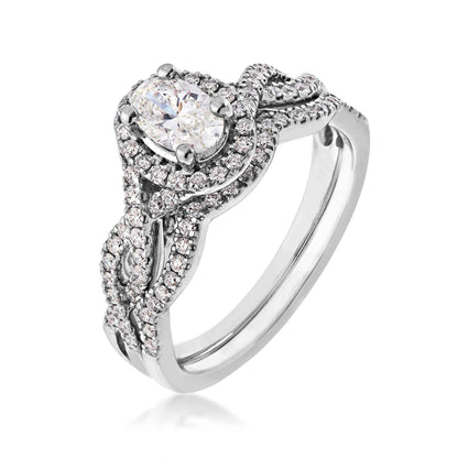 Natural 1 ct. tw. Oval Diamond Halo Twist Wedding Set in 14K White Gold front view