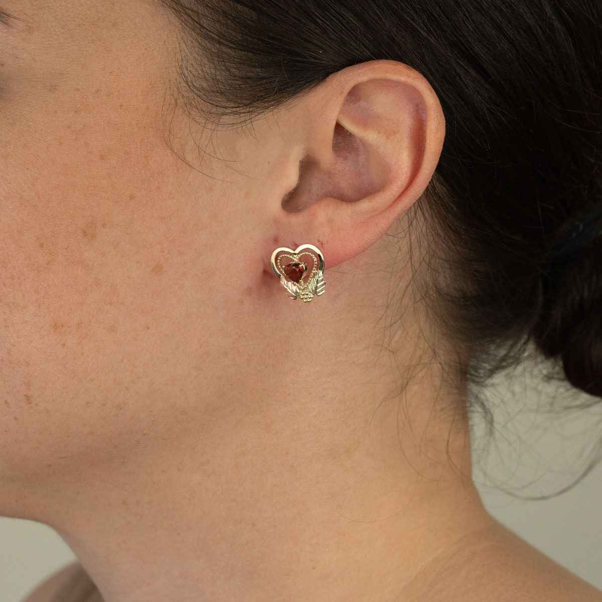 Black Hills Gold Garnet Milgrain Double Heart Earrings in 10K Yellow Gold front view