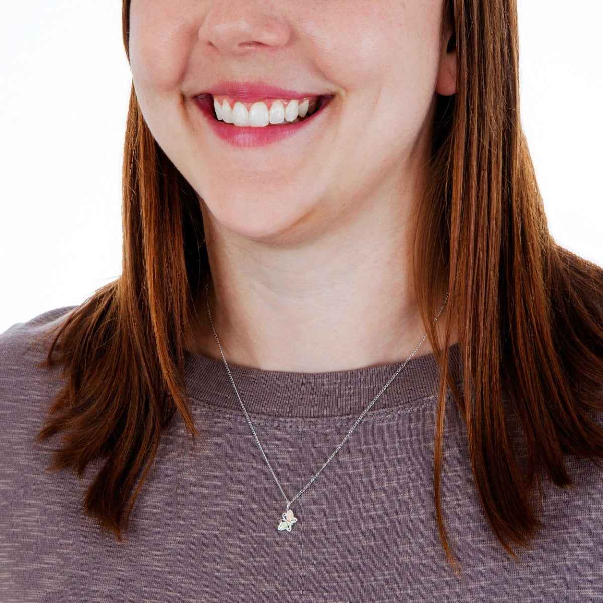 Black Hills Gold Small Leaf Winged Butterfly Pendant in Sterling Silver close-up detail