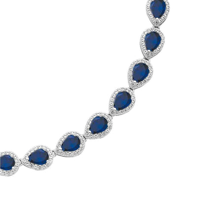Created Pear Blue & White Sapphire Halo Necklace in Sterling Silver close-up detail