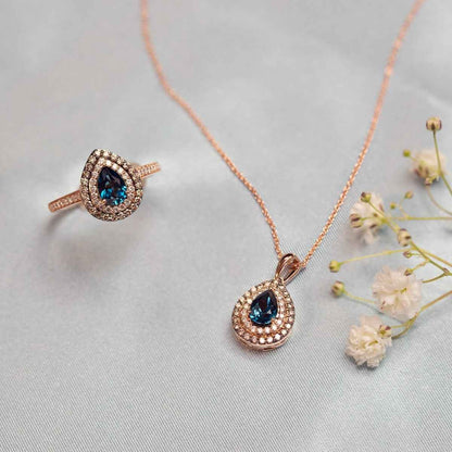 Le Vian Chocolatier Pear Deep Sea Blue Topaz & 1/3 ct. tw. Chocolate & Vanilla Diamond Double Halo Pendant in 14K front view