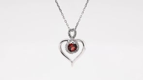 Red Garnet and 1/10 ct. tw. Diamond Heart Pendant in Sterling Silver front view