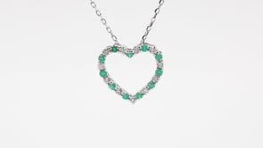 Emerald and .08 ct. tw. Diamond Heart Pendant in 10K White Gold front view