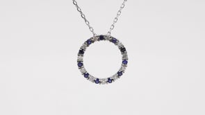 Sapphire and 1/8 ct. tw. Diamond Circle Pendant in 10K White Gold front view
