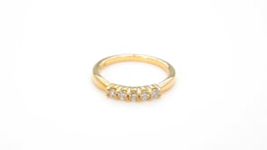 1/4 ct. tw. Round Brilliant Diamond 5-Stone Anniversary Band in 14K Yellow Gold close-up detail