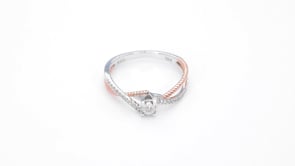 1/8 ct. tw. Diamond Promise Ring with Crossover Diamond and Rope Band in 10K White and Pink Gold close-up detail