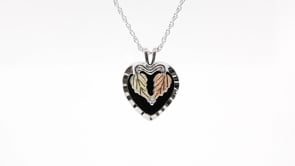 Black Hills Gold Onyx Heart & Leaf Pendant in Sterling Silver front view