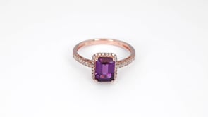 Emerald Cut Rhodolite Garnet and 1/5 ct. tw. Diamond Halo Ring in 10K Pink Gold close-up detail