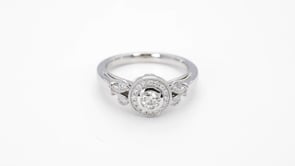 Elegance 1/2 ct. tw. Round Diamond Bezel Set Halo Engagement Ring with Vintage Filigree & Milgrain Detailing close-up detail