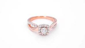 Natural 7/8 ct. tw. Round Brilliant Diamond Halo Twist Engagement Ring in 14K Pink Gold front view