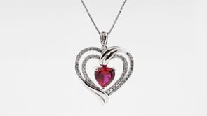 Created Heart-Shaped Ruby and White Sapphire Double-Heart Pendant in Sterling Silver close-up detail
