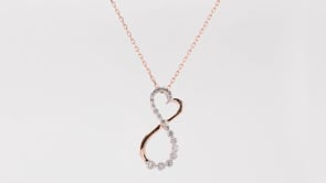 Journey 1/4 ct. tw. Round Diamond Infinity Heart Pendant in 10K Pink Gold side profile