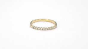 1/5 ct. tw. 13-stone prong-set anniversary band in 10K yellow gold close-up detail