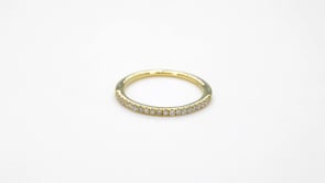 1/7 ct. tw. Ladies' Diamond Prong Band in 14K Yellow Gold close-up detail