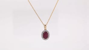 Kallati Oval Ruby and 1/6 ct. tw. Diamond Halo Pendant in 14K Yellow Gold front view