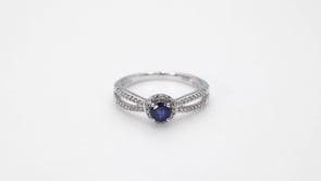 Sapphire and 1/6 ct. tw. Diamond Halo Split Shank Ring in 10K White Gold close-up detail