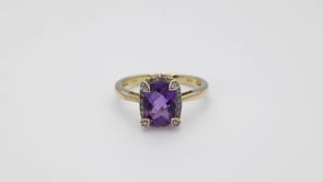Created Cushion Amethyst and Diamond Halo Ring in 10K Yellow Gold close-up detail