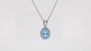 Oval Swiss Blue Topaz and Created White Sapphire Halo Pendant in Sterling Silver front view