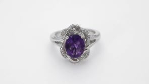 Oval Amethyst and Created White Sapphire Swirl Halo Ring in Sterling Silver close-up detail