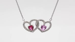 Heart Shaped Created Ruby Pink Sapphire and White Sapphire Double Heart Pendant in Sterling Silver front view