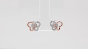Infinite Love 1/10 ct. tw. Diamond Butterfly Earrings in Sterling Silver and 10K Pink Gold close-up detail