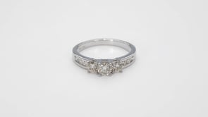 1 ct. tw. Round 3-Stone Diamond Anniversary Ring with Channel Set Side Diamonds in 10K White Gold side profile