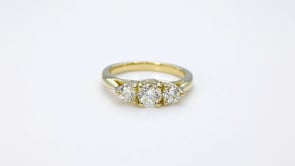 1 ct. tw. 3-Stone Round Brilliant Diamond Anniversary Ring in 14K Yellow Gold close-up detail