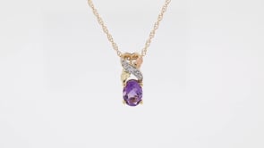 Black Hills Gold Oval Amethyst & Diamond Accent Twist Pendant in 10K Yellow Gold close-up detail
