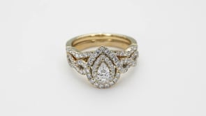 Natural 1 ct. tw. Pear Diamond Double Halo Twist Wedding Set in 10K Yellow Gold front view