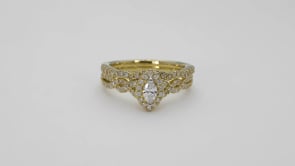Amaura 5/8 ct. tw. Marquise Diamond Halo Infinity Band Wedding Set in 10K Yellow Gold front view