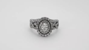 Natural 1-1/2 ct. tw. Oval Diamond Double Halo Twist Wedding Set in 14K White Gold front view
