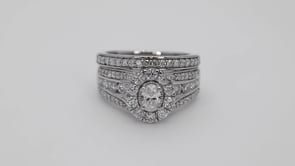 Amaura 1-1/2 ct. tw. Oval Diamond Halo with Multi-Row Diamond Band Wedding Set in 10K White Gold front view