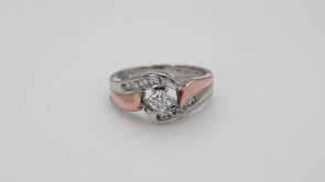 1/2 ct. tw. Round Brilliant Diamond Wedding Set with Channel Set Diamond Band in 14K Two-Tone Gold front view
